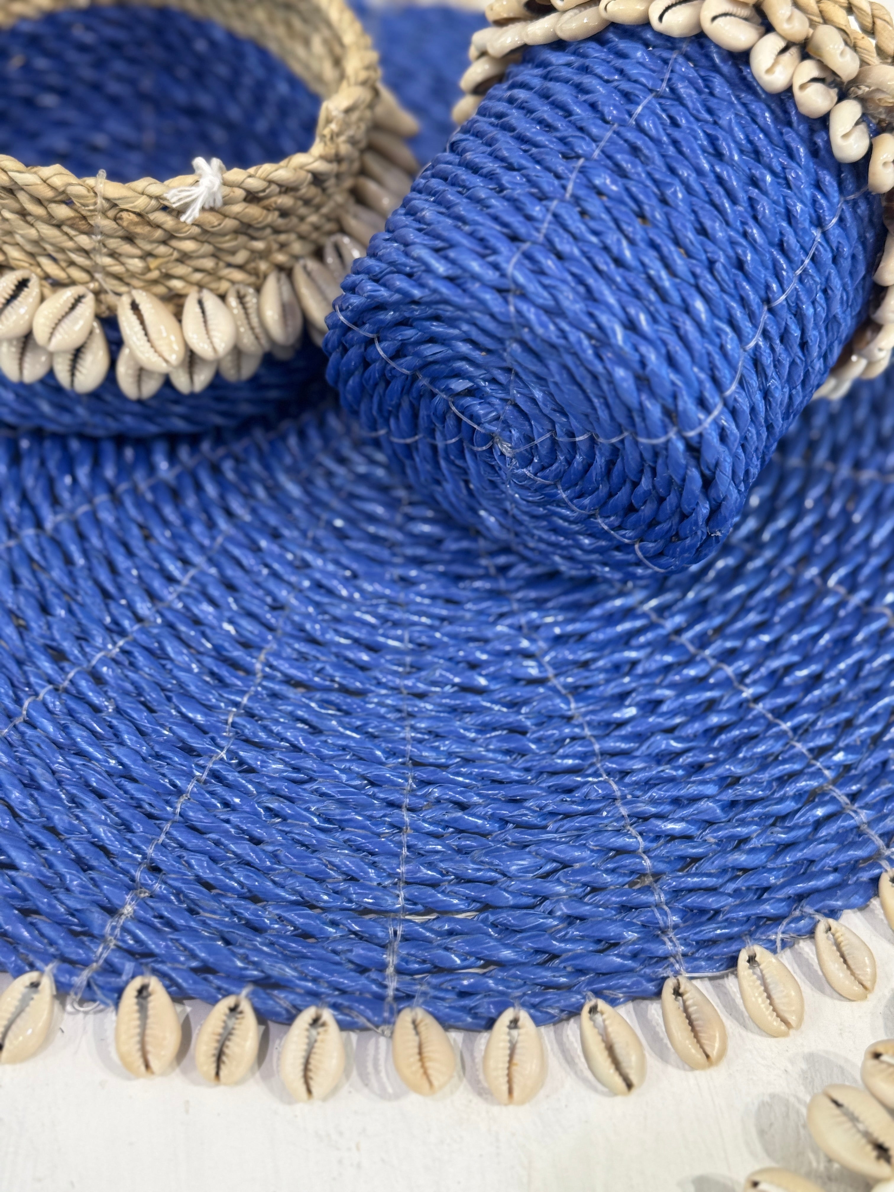 Placemat tondo in giunco con conchiglie