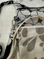 Pochette in batik e pvc con tracollina