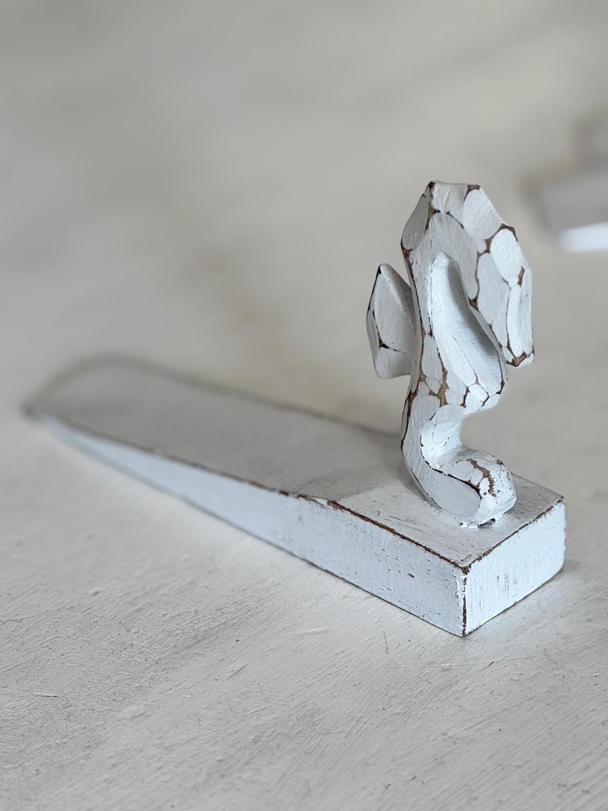 Fermaporta in legno