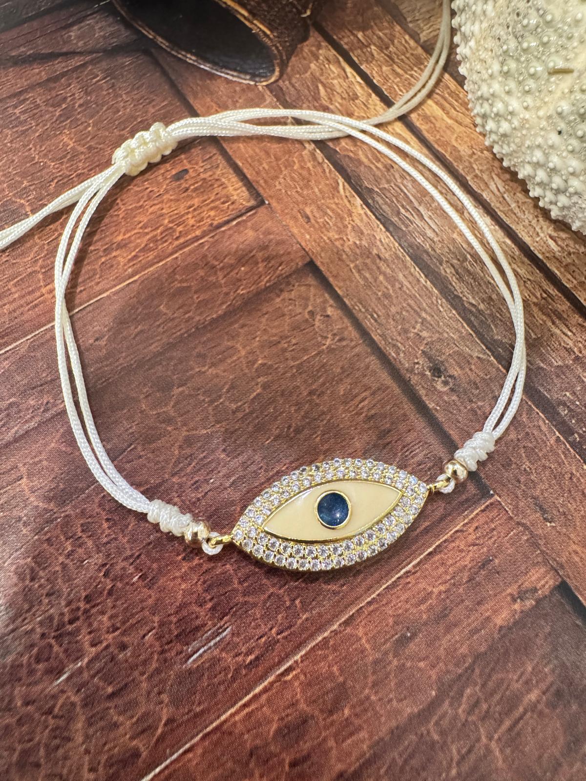 BRACCIALE FILO DI COTONE E PICCOLI ZIRCONI