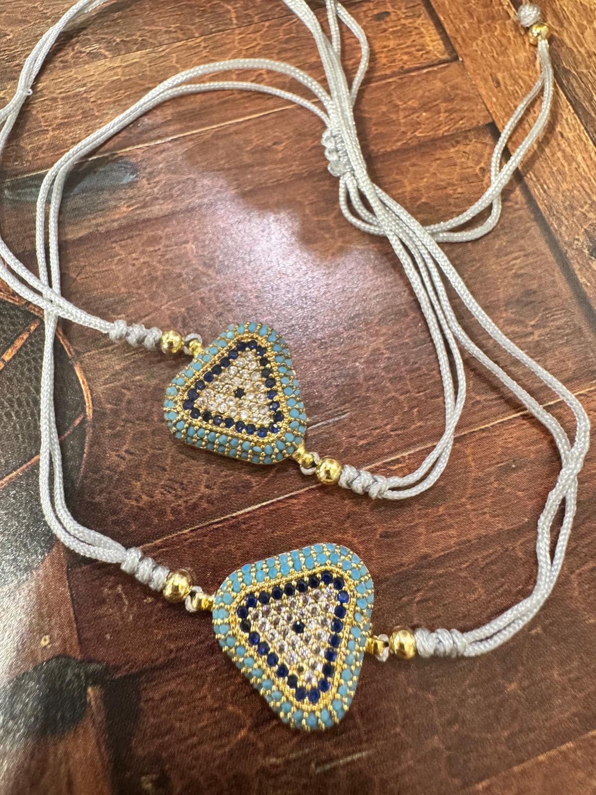 BRACCIALE FILO DI COTONE E PICCOLI ZIRCONI