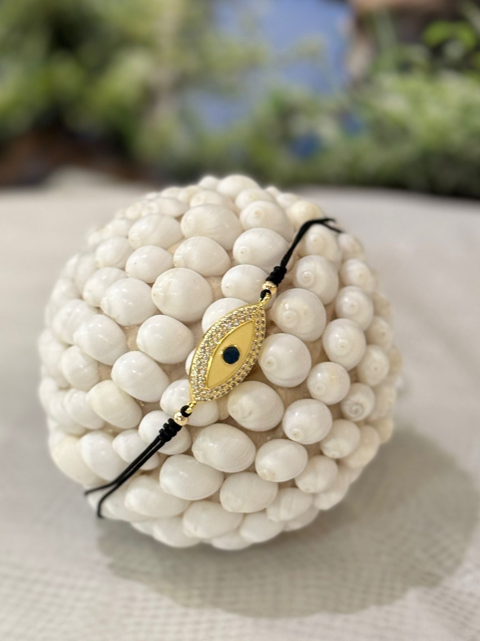 BRACCIALE FILO DI COTONE E PICCOLI ZIRCONI