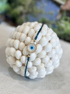 BRACCIALE FILO DI COTONE E PICCOLI ZIRCONI