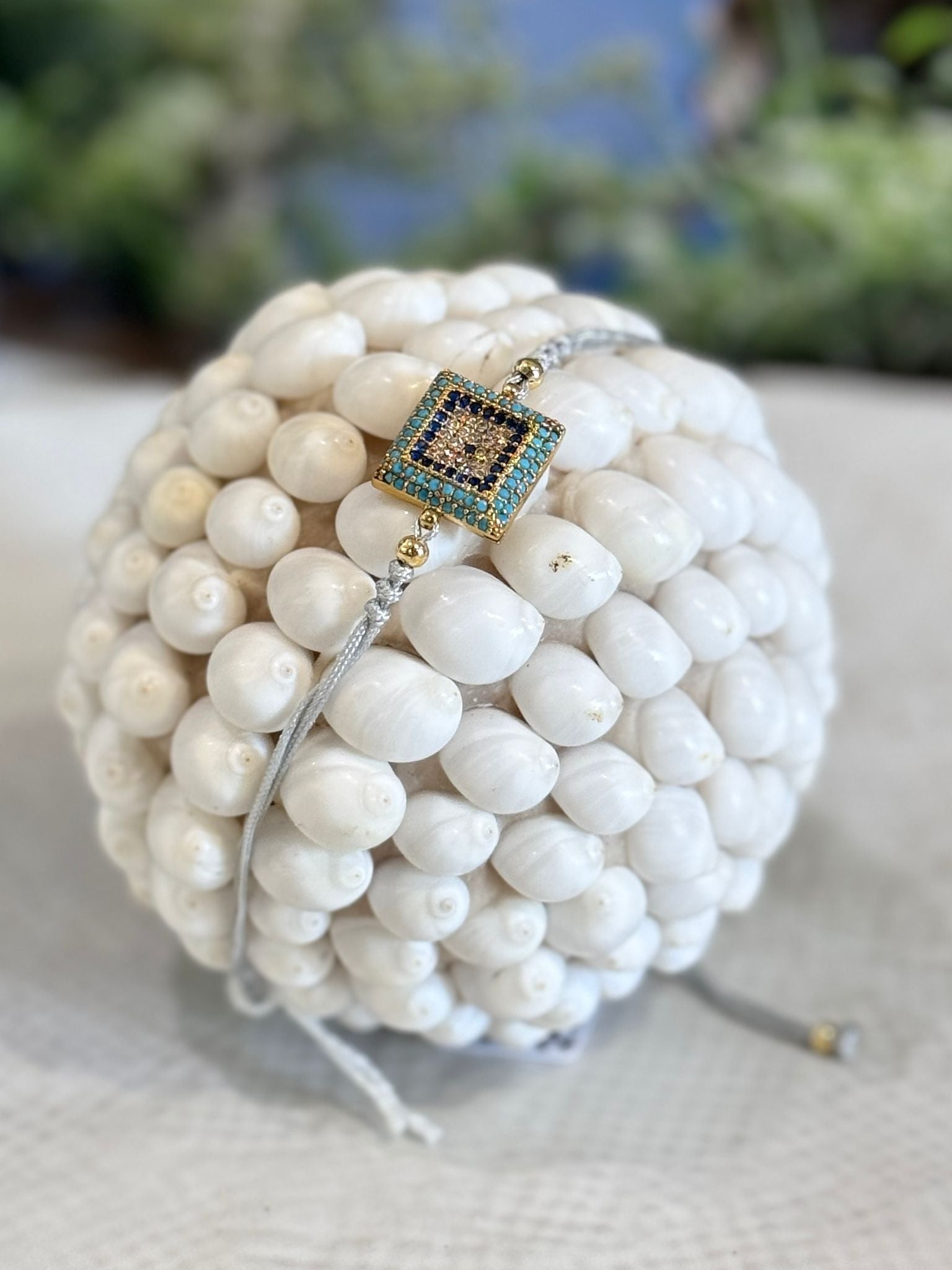 BRACCIALE FILO DI COTONE E PICCOLI ZIRCONI