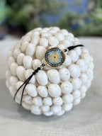BRACCIALE FILO DI COTONE E PICCOLI ZIRCONI