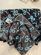 Pochette in batik e pvc con tracollina