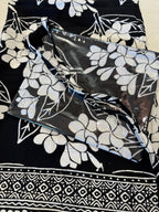 Pochette in batik e pvc con tracollina