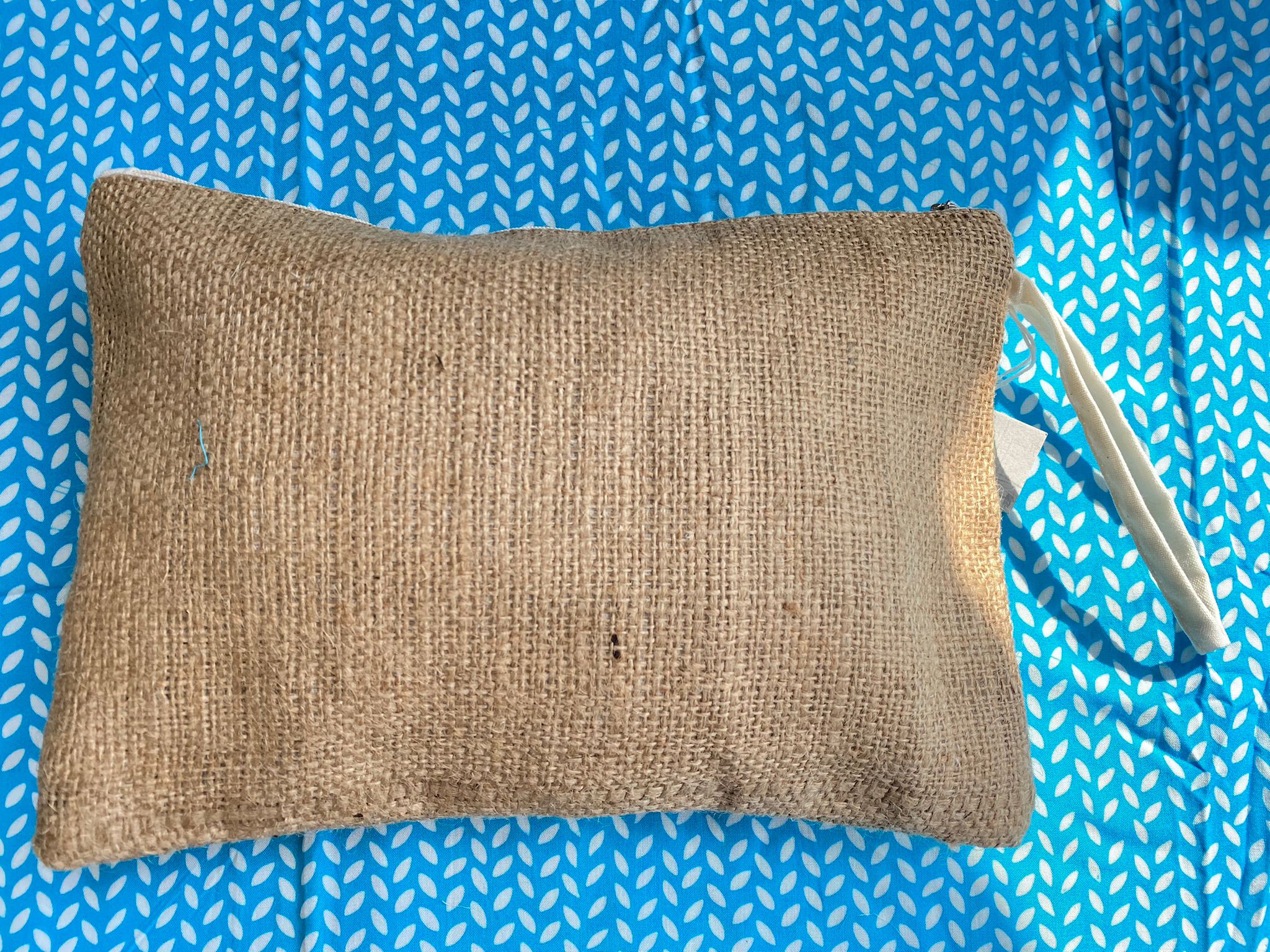 POCHETTE IN JUTA TASSEL PALLINE LEGNO